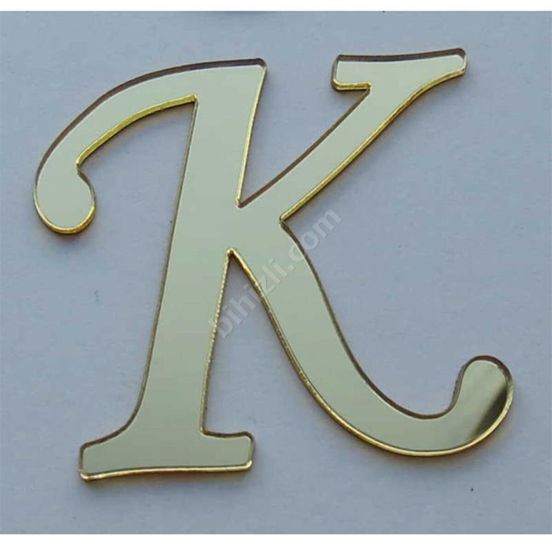 K harfi (altın renk)